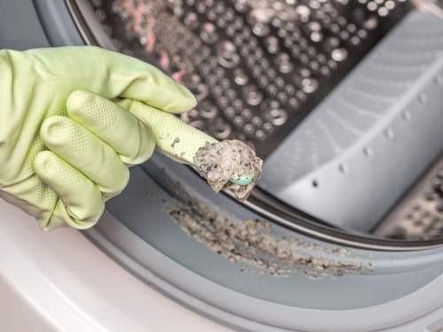 Kako očistiti veš mašinu - prljavština u gumi mašine za pranje veša